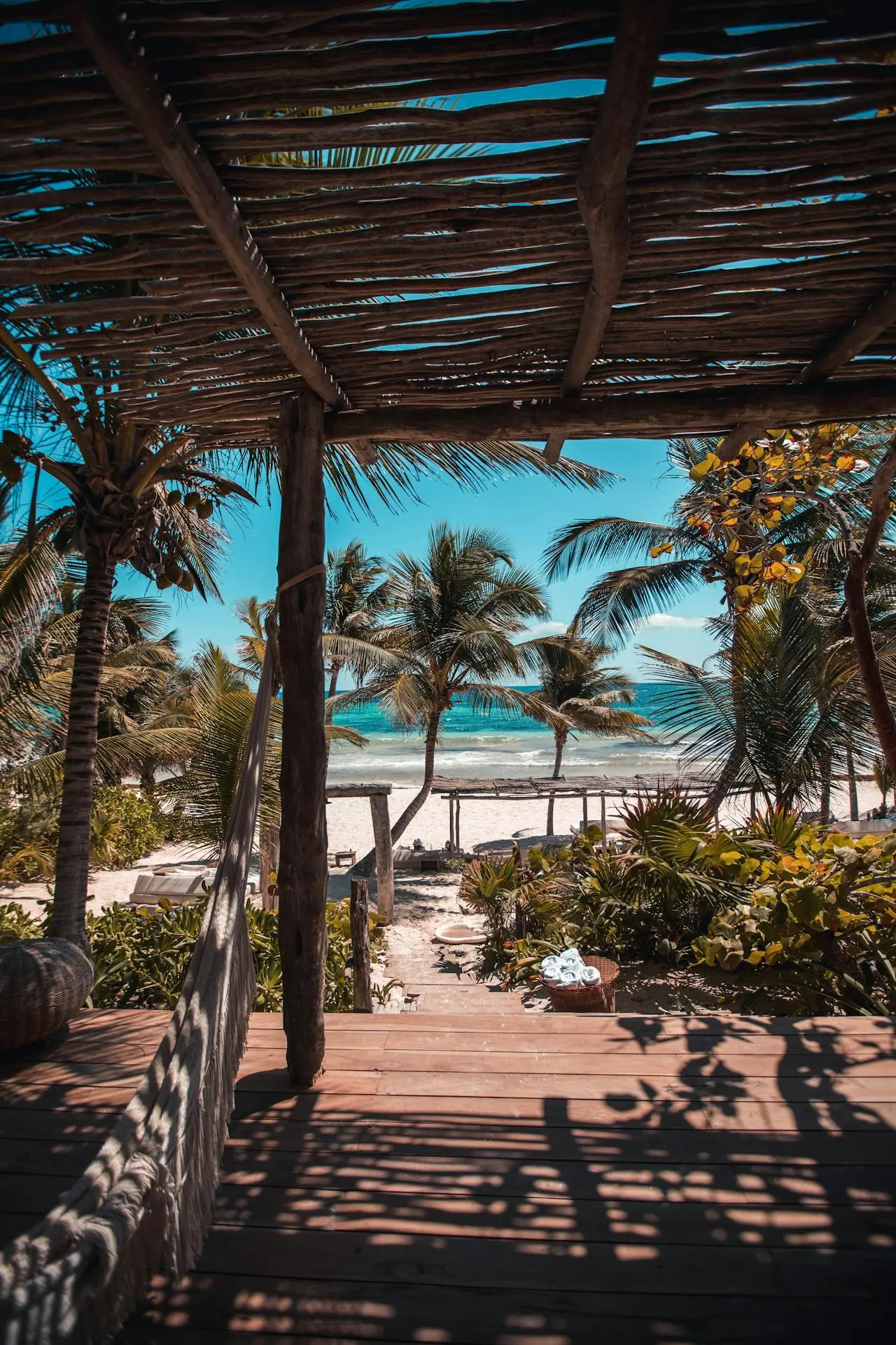 Anantara Dhigu family beach villa with kids playing on the sand