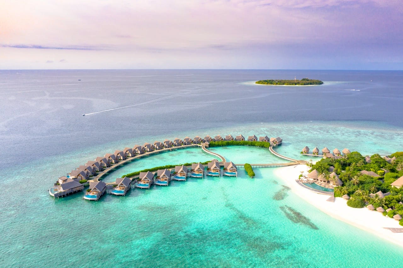 Milaidhoo Island small-boat arrival and boutique island resort