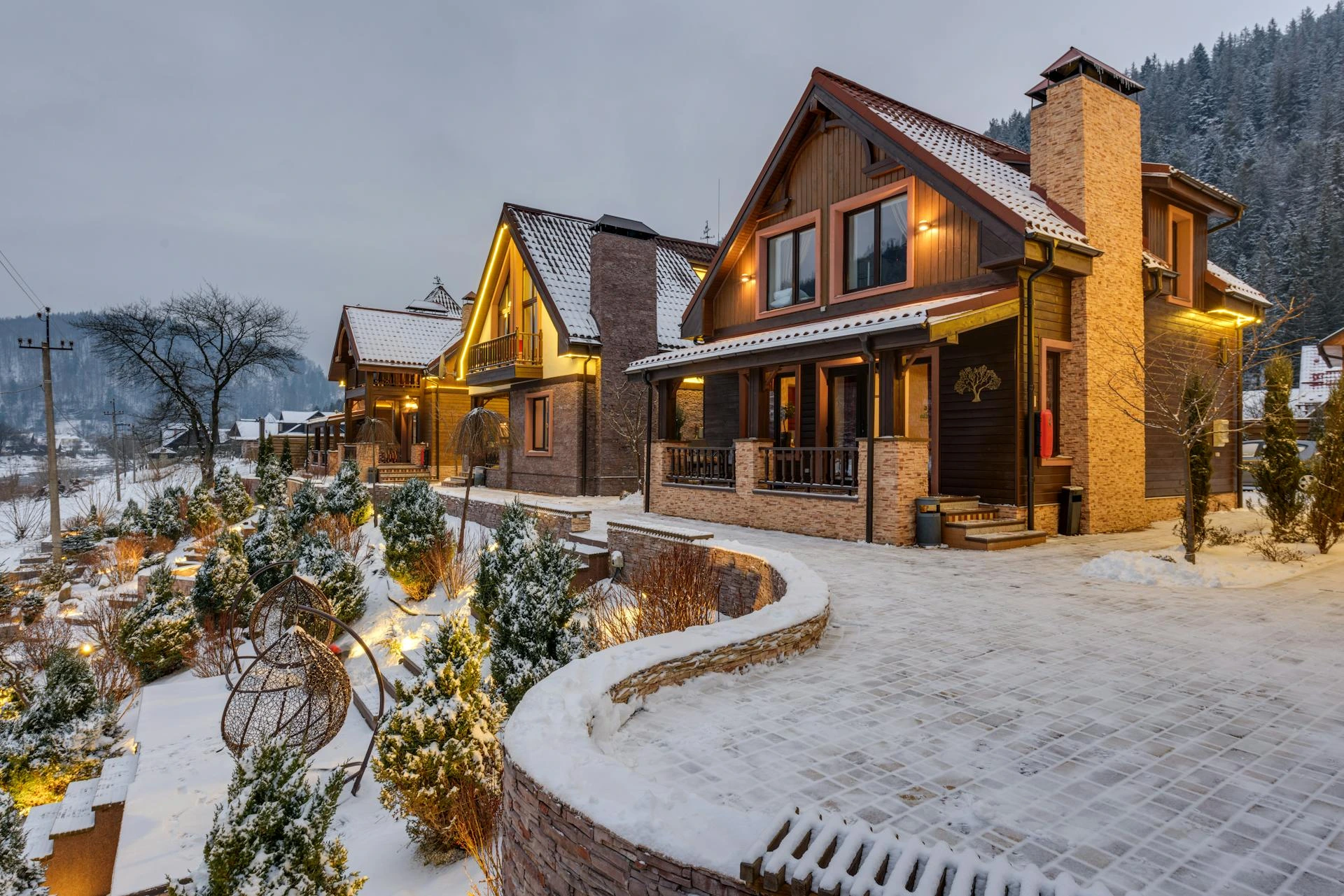 Luxury ski lodge with snow-covered mountains