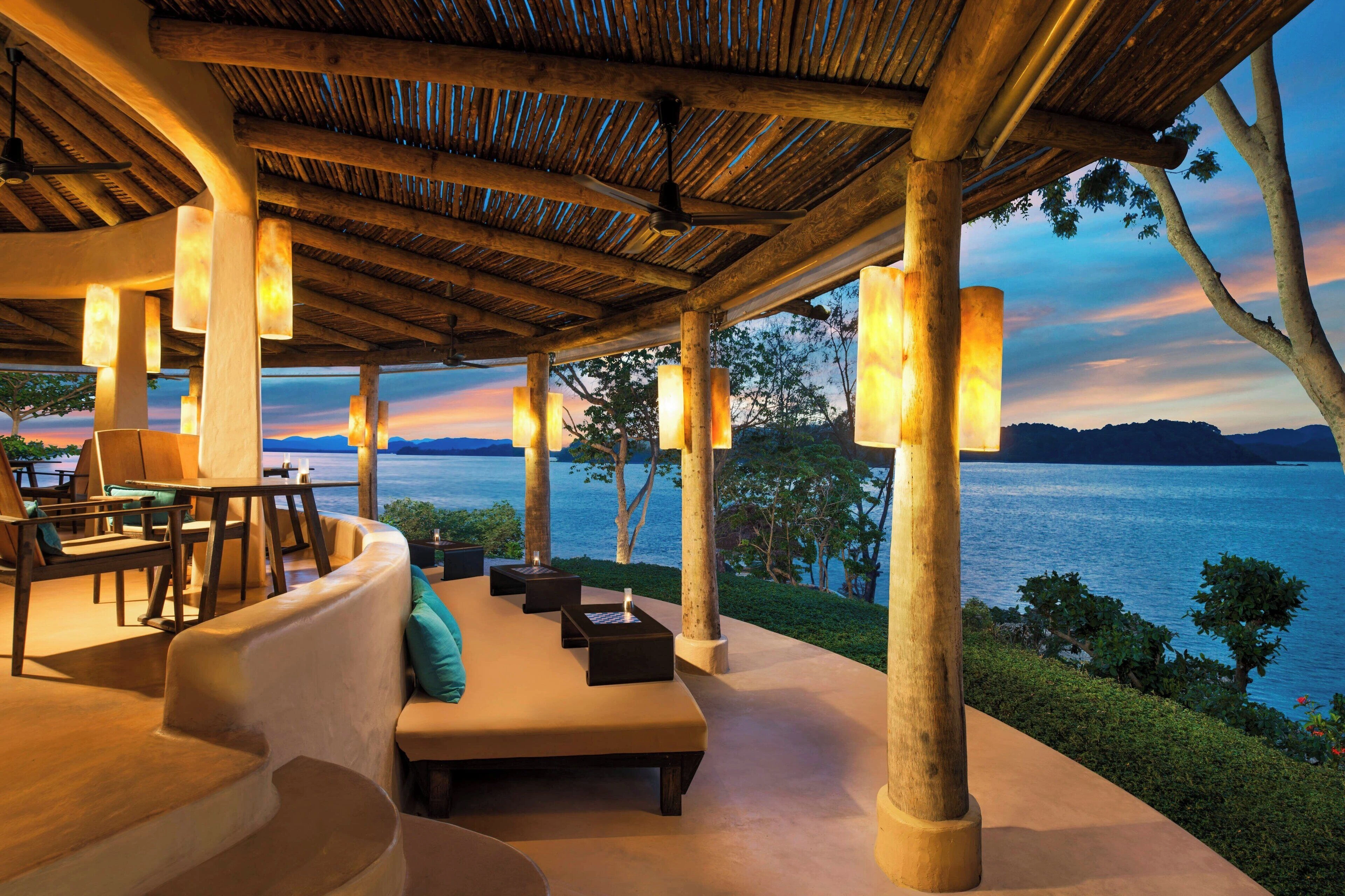 Naka island view in Phuket with beautiful collidal and chairs
